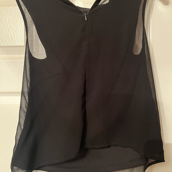 Black sheer top worn only a few times, great for work or play. - Picture 2 of 3